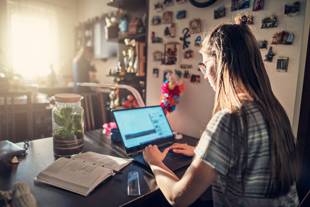 girl-using-laptop-at-home